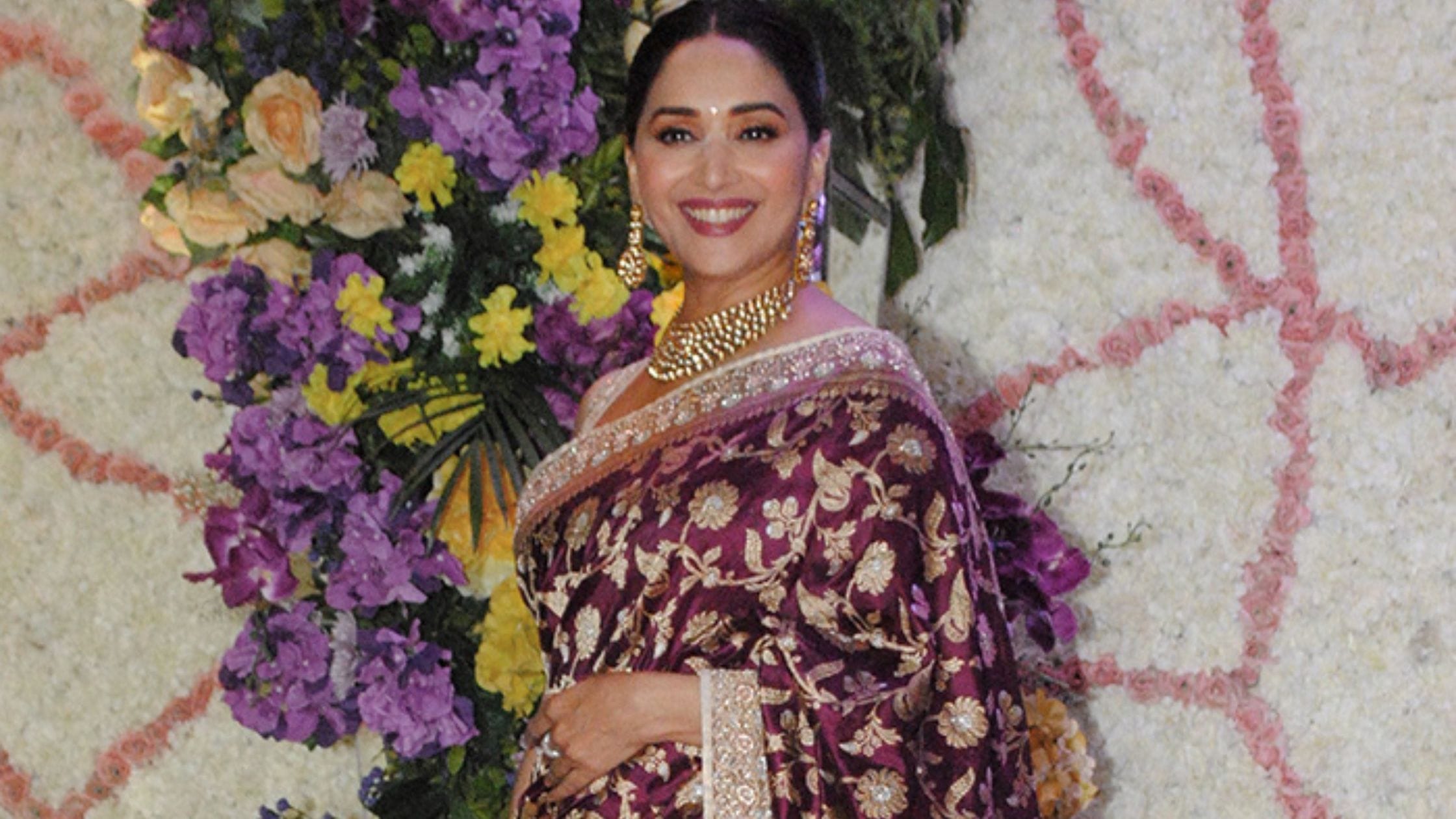Madhuri Dixit in Wine Color Banarasi Saree