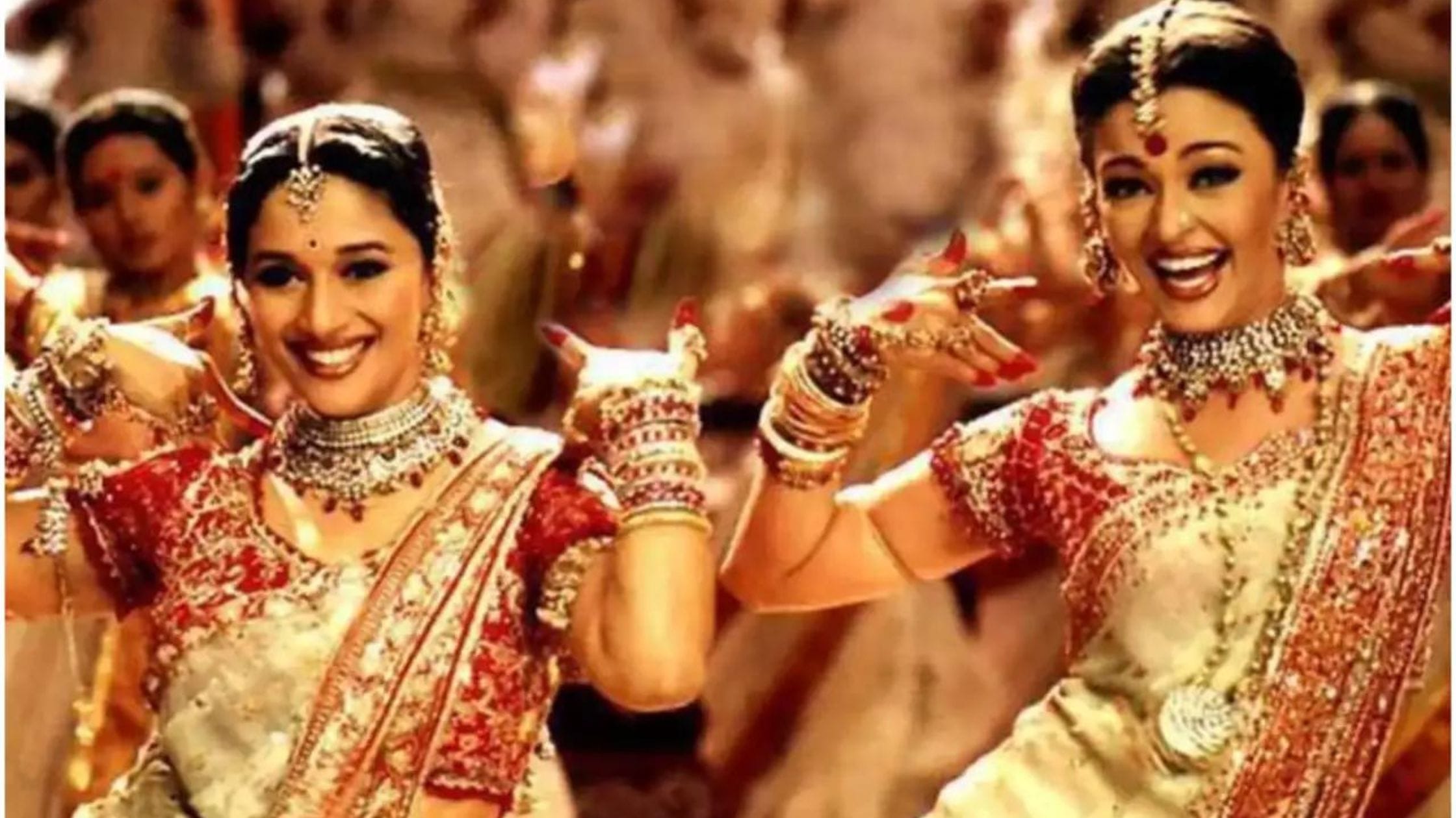 Aishwarya rai and Madhuri Dixit in Red and White Banarasi Saree