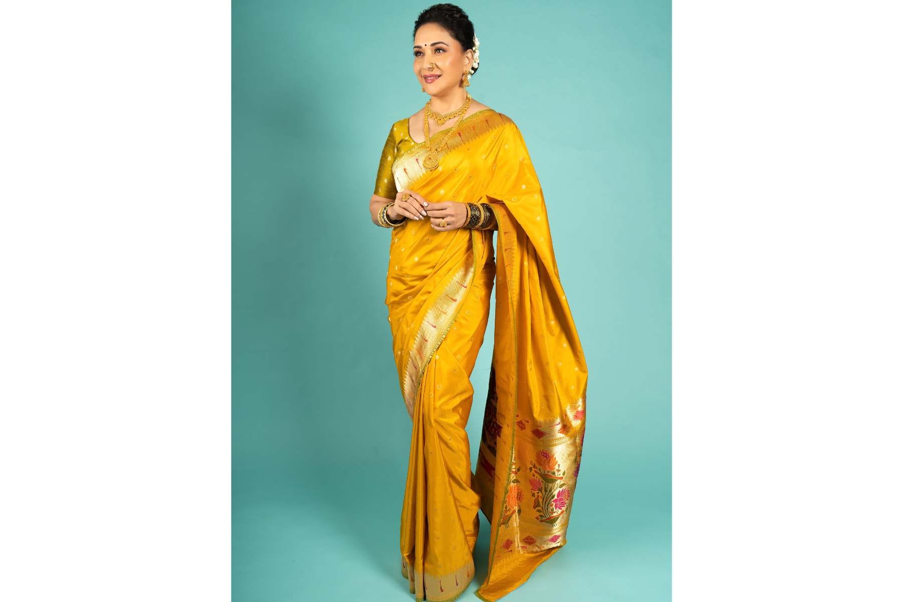 Madhuri Dixit in Yellow Banarasi Paithani Saree