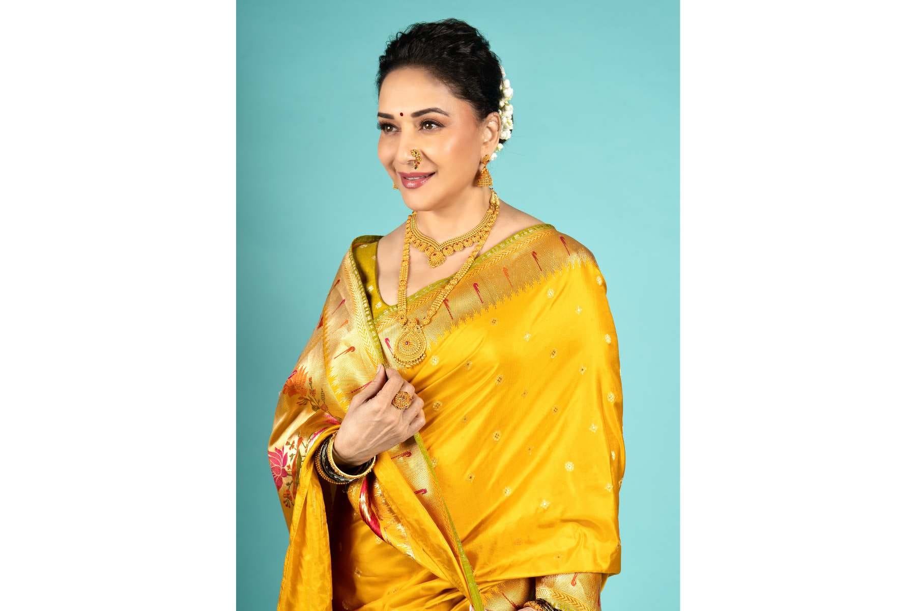 Madhuri Dixit in Yellow Banarasi Saree